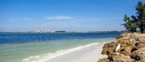 Shoreline view at Big Pass on Siesta Key, Florida, showing calm Gulf conditions to help choose the best time to visit Siesta Key.